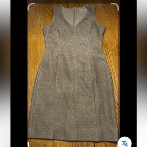 Iris Setlakwe tan sleeveless V-Neck dress.  Good condition except. Size 10.